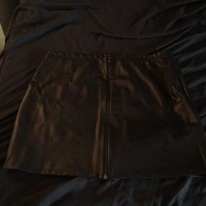 Black leather mini skirt